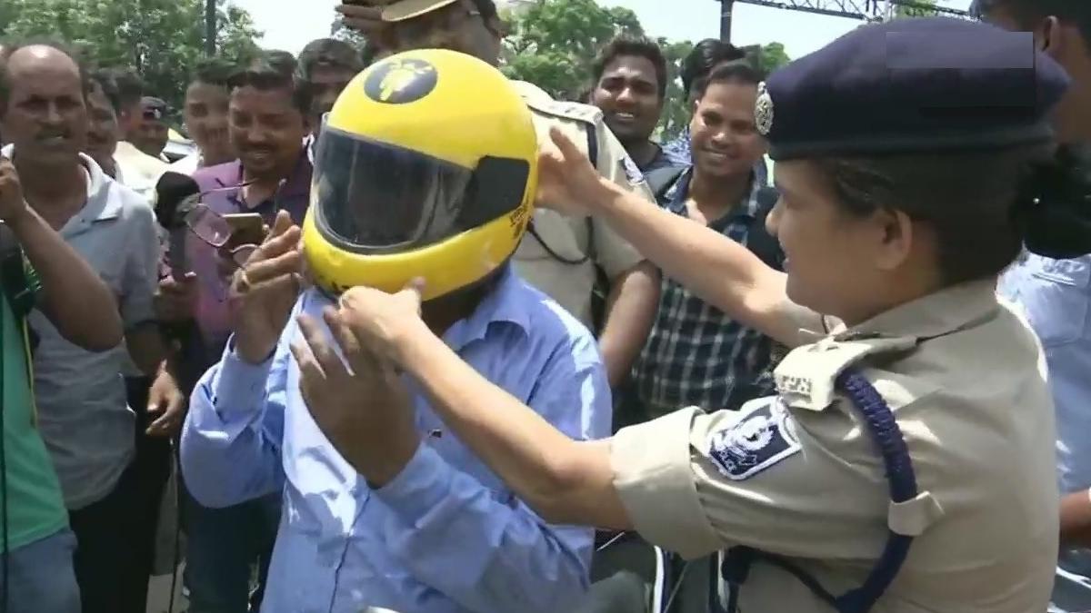 Odisha Police distributes free helmets to traffic violators in Bhubaneswar