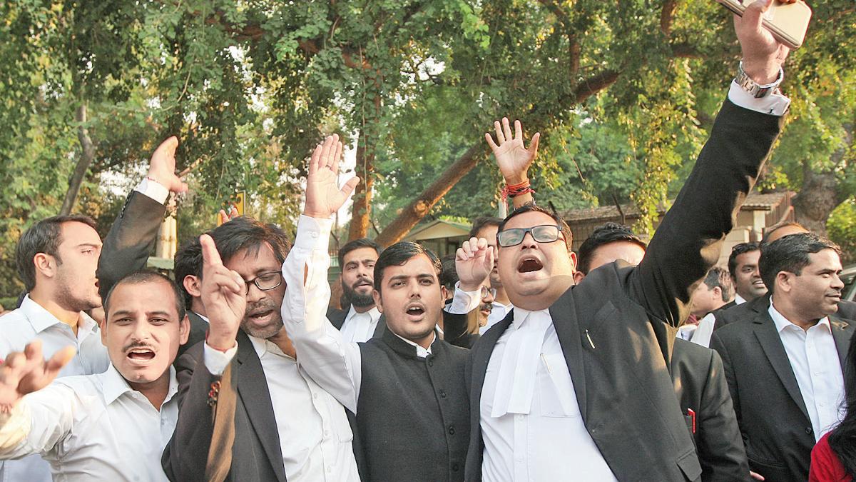 Lawyers raise slogans during their two-week protests in the aftermath of the violent clashes with the police triggered by a row over ‘illegal’ parking. (Photo: Mail Today)