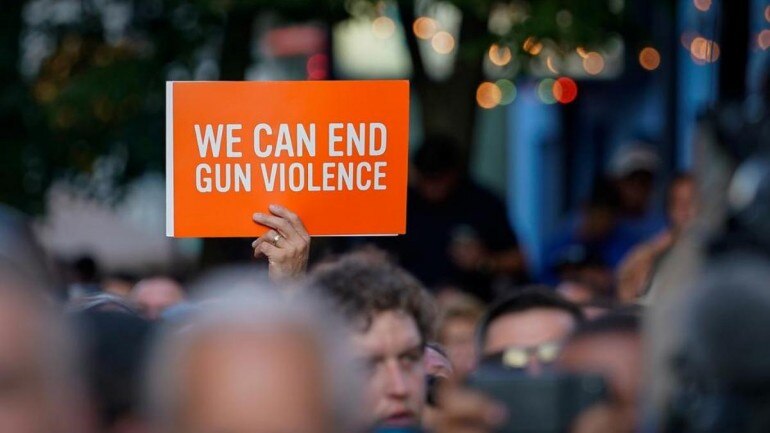 As many as 12 people were killed and about 50 were injured in mass shootings across the United States over the weekend. 