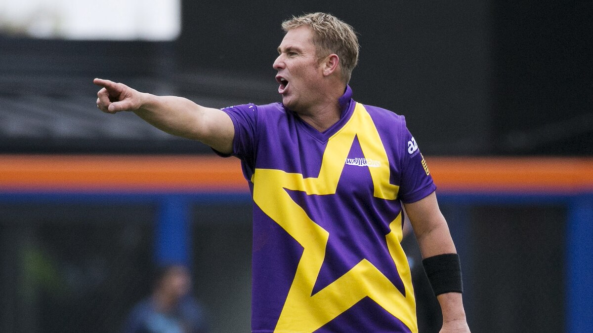 shane warne jersey number