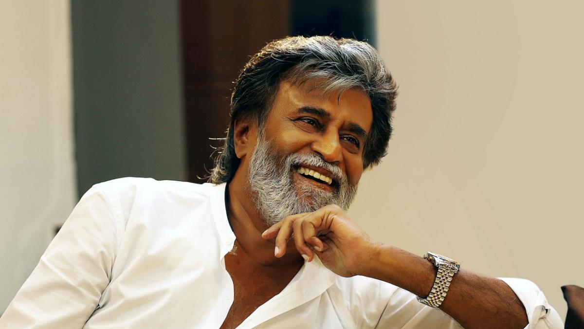 Rajinikanth wears a face mask for a drive in his luxury car ...