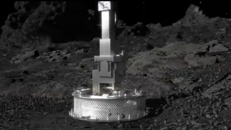 Nasa’s Osiris-Rex probe collects rock sample from asteroid Bennu in