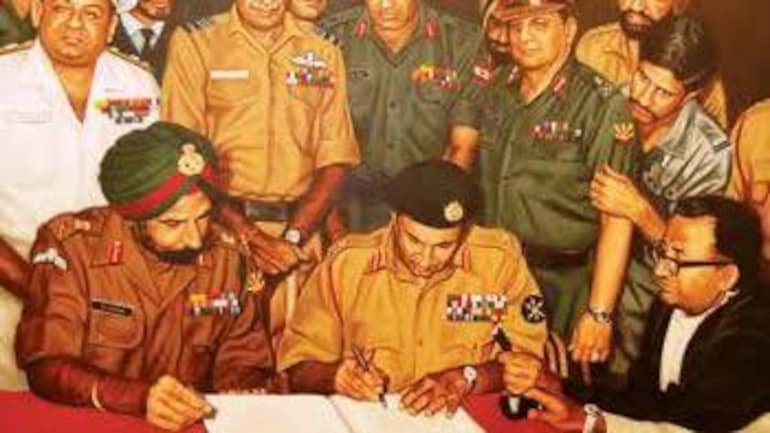 Key military leaders and representatives observe the signing of a crucial document, symbolizing establishment of authority during Bangladesh Liberation War, 1971.