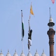 Farmers hoist flags at the Red Fort during the Kisan Gantantra Parade amid the 72nd Republic Day celebrations, in New Delhi |(Yasir Iqbal/India Today) Farmers hoist flags at the Red Fort during the Kisan Gantantra Parade amid the 72nd Republic Day celebrations, in New Delhi |(Yasir Iqbal/India Today)