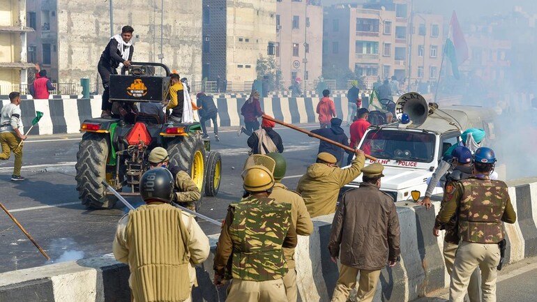 Protesters clash with police in Delhi; farmer unions blame each other - India News