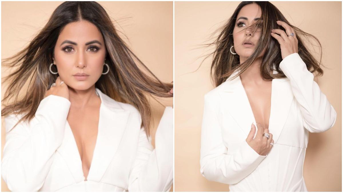 Hina Khan is a beauty in white dress with plunging neckline. See pics