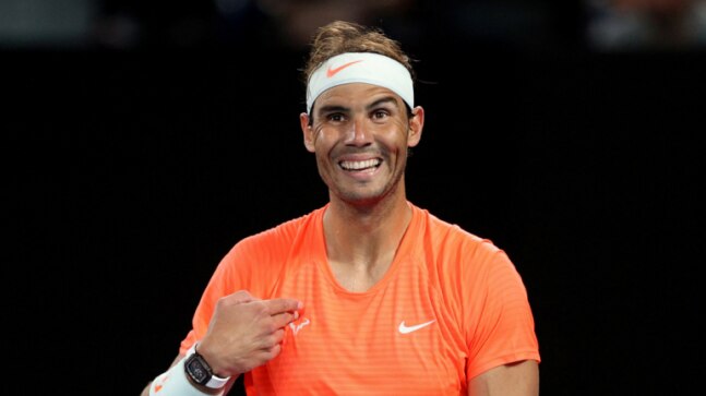 What me? Surprised Rafael Nadal smiles as unruly fan swears at Spaniard at Australian Open thumbnail