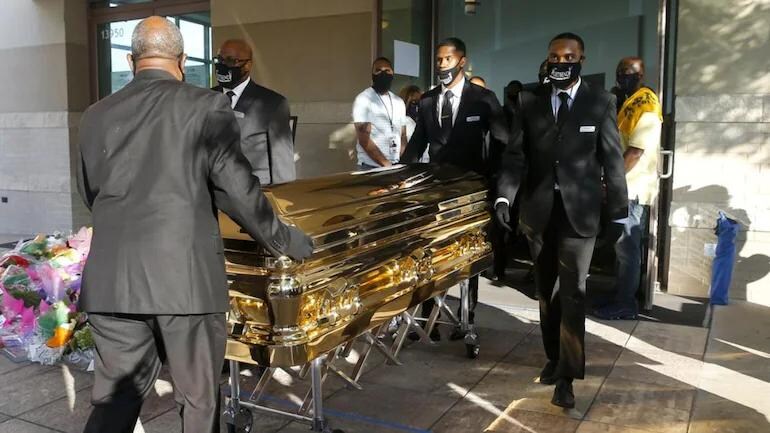 Derek Chauvin charged with the murder of George Floyd Minneapolis settles case will $ 27million 3 George Floyd's casket bought to church following public visit