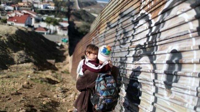 Two girls, 3 and 5, dropped over 14-foot border barrier at US-Mexico border