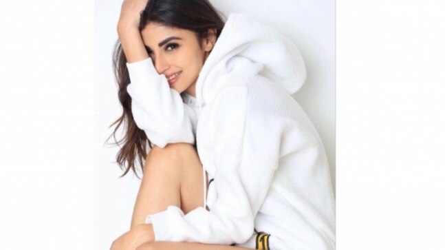 Mouni Roy styles Rs 2k hoodie with shorts for stunning photoshoot. See pics