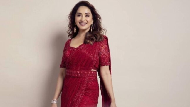 Madhuri Dixit is resplendent in red saree for new photoshoot. All pics