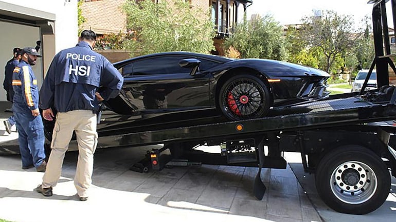 US man buys Ferrari with govt aid US man buys Ferrari with govt aid