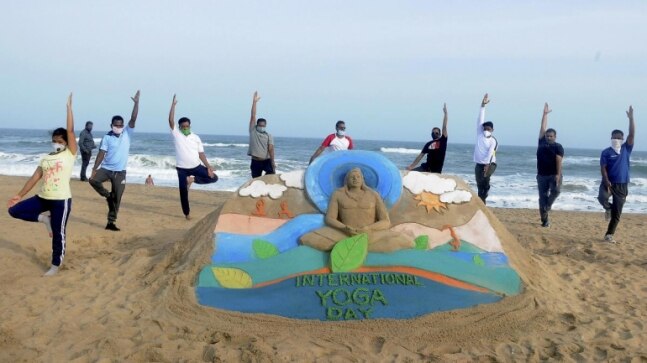 In pictures and videos: India celebrates International Yoga Day amid Covid pandemic