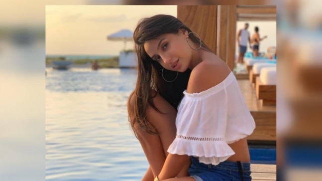 Nora Fatehi rocks a bikini in style but there's a twist