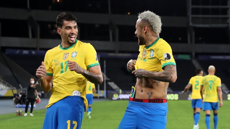 Lucas Paqueta celebrates with Neymar after scoring Brazil's only goal. (Reuters Photo)