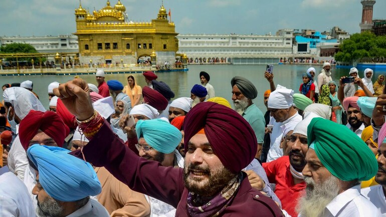 MLAs who accompanied Navjot Singh Sidhu on his full-day temple visits Wednesday are reportedly on the radar of the Punjab Criminal Investigation Department. (Photo: PTI) MLAs who accompanied Navjot Singh Sidhu on his full-day temple visits Wednesday are reportedly on the radar of the Punjab Criminal Investigation Department. (Photo: PTI)