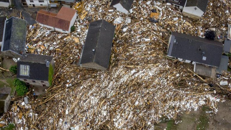 Debris from houses and trees surround houses in Schuld, Germany, Friday, July 16, 2021. (Image: AP) Debris from houses and trees surround houses in Schuld, Germany, Friday, July 16, 2021. (Image: AP)