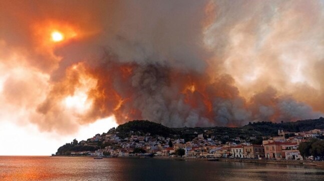 Flames surround island monastery as fires rage in Greece