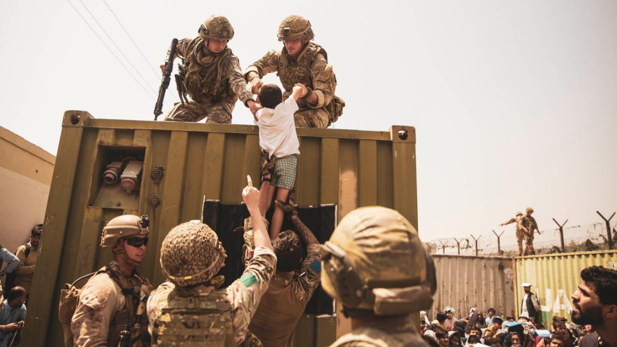 US, British and Turkish forces assist with the evacuation of Kabul Airport on Friday