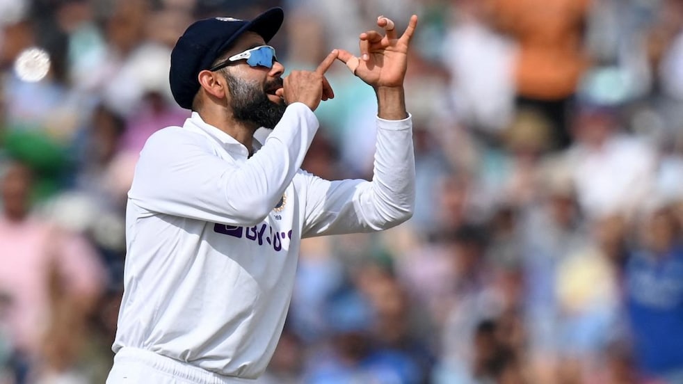 India's captain Virat Kohli gestures towards a trumpet-playing England fan during play on the fifth day of the fourth cricket Test match between England and India at the Oval (Courtesy: AFP)