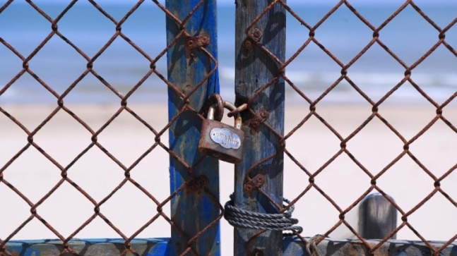 Behind barricades, Vietnam battles ‘enemy’ virus | See Pics