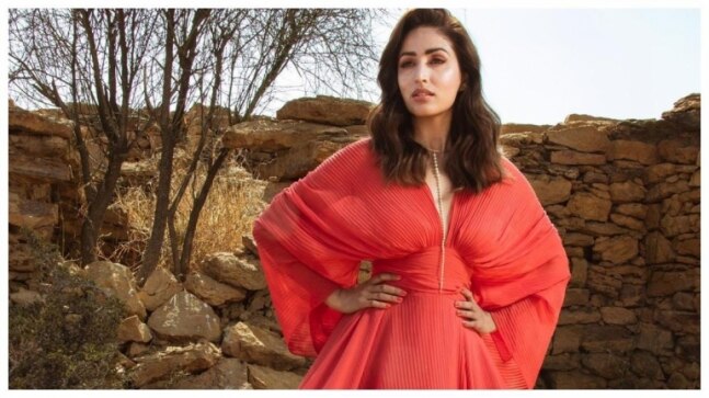 Yami Gautam in Rs 78k red pleated dress looks divine. Don't miss stunning pics