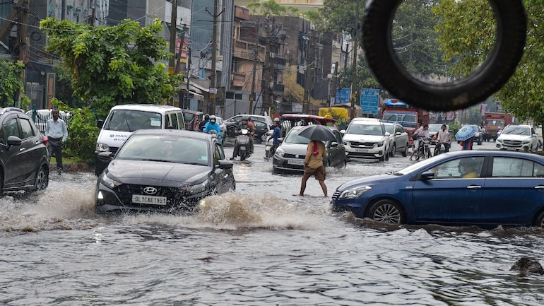 Delhi Weather News: Heavy rainfall batters Delhi, roads waterlogged day after record downpour - Cities News