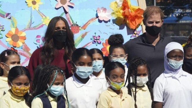 Harry and Meghan Markle visit students at a Harlem school