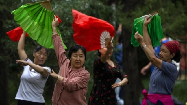 After months in lockdown, a weary world is ready to dance | See Pics