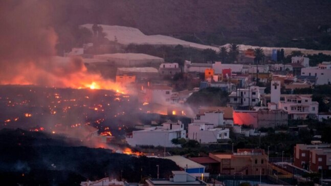 Spain's La Palma evacuees see no end to ordeal after month of volcanic eruption | See Pics