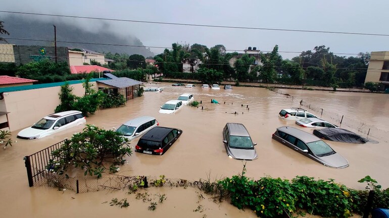 Sunken cars in a flooded resort in Uttarakhand on Tuesday