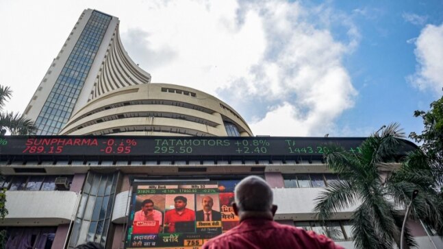 Sensex rallies 569 points to fresh record; Nifty tops 18,300-mark
