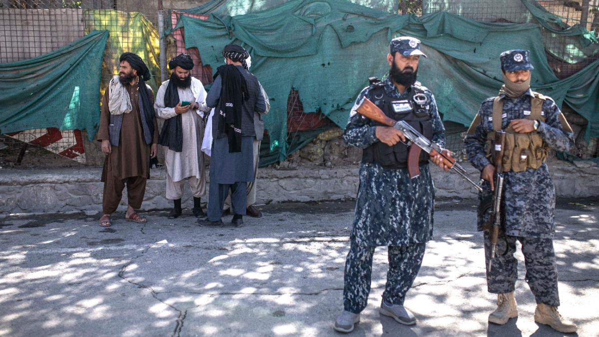 File photo of a Taliban fighter stand guard after an explosion in Kabul on Oct 20, 2021