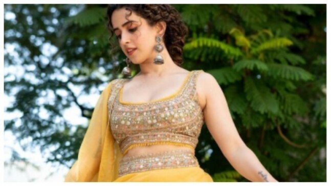 Sanya Malhotra looks as fresh as a daisy in yellow embellished lehenga. Pics here