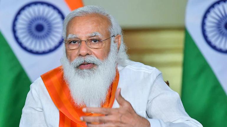 Engage religious leaders to fight rumour against Covid vaccine: PM Modi tells DMs