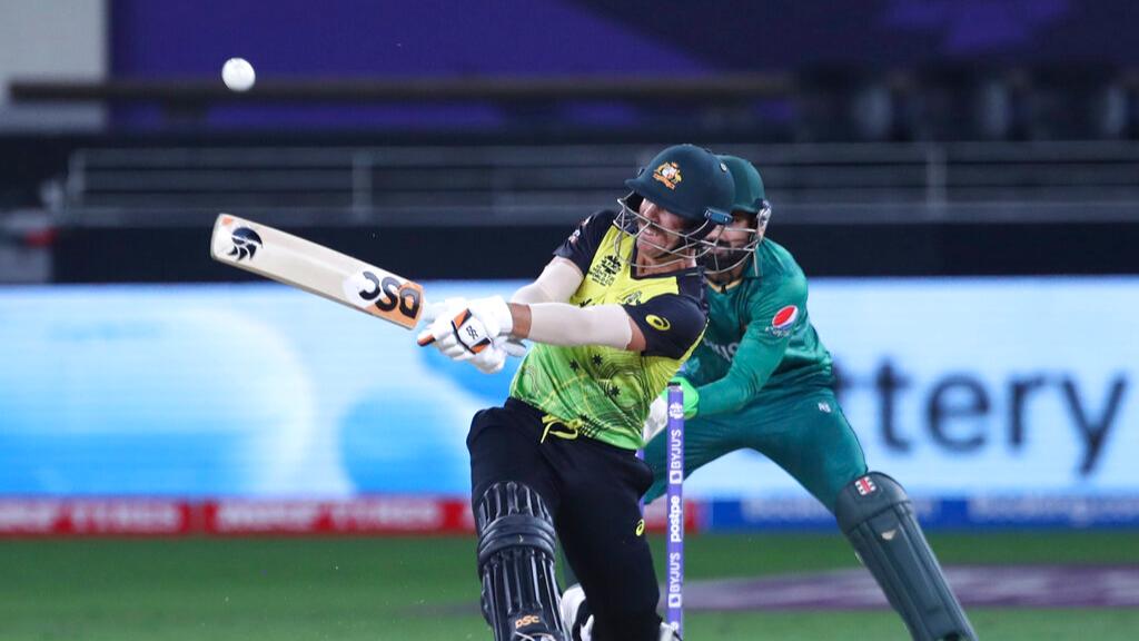 David Warner hit a six after the ball slipped out of Mohammad Hafeez's hand and pitched twice (AP Photo)