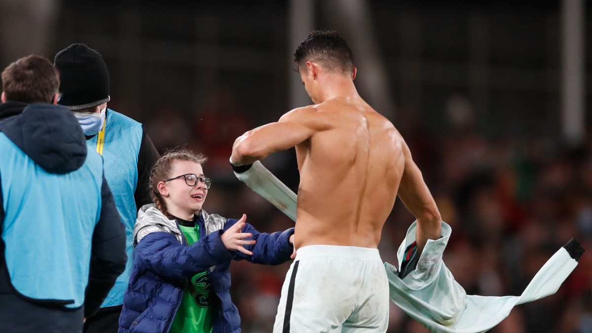 Cristiano Ronaldo gives shirt to emotional young girl who ran onto pitch after Portugal's goalless draw