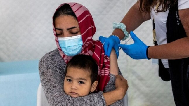 Refugees denied Covid-19 shots because drugmakers fear lawsuits: Report - Vimarsana News
