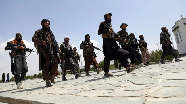 Suicide bomber gunned down in Kabul as Taliban fighters gather for passports