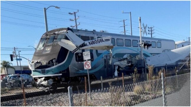 Plane hit by train after crashing on railway tracks in California