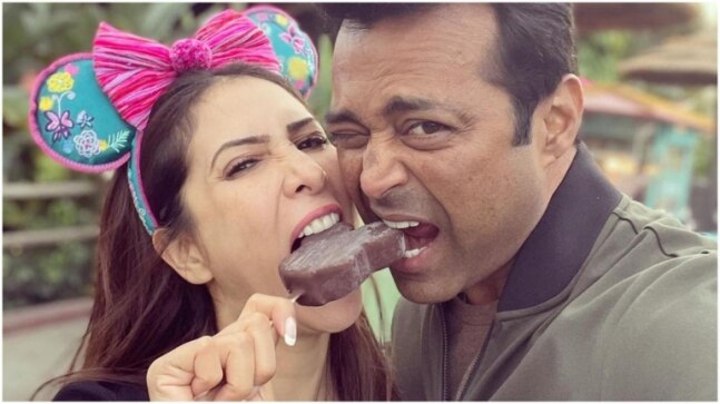 Kim Sharma enjoys a fun day with boyfriend Leander Paes at US Disney theme park. See pics