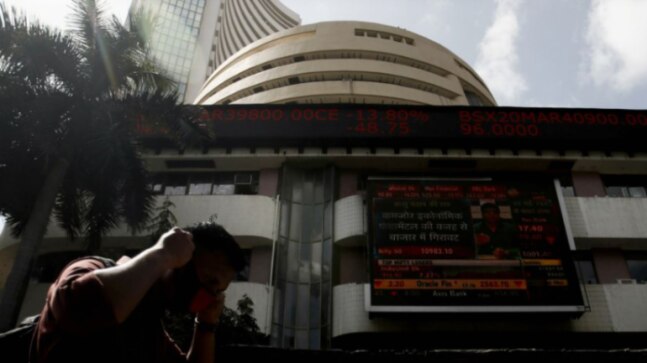 Sensex, Nifty muted as HCL Tech losses offset auto gains