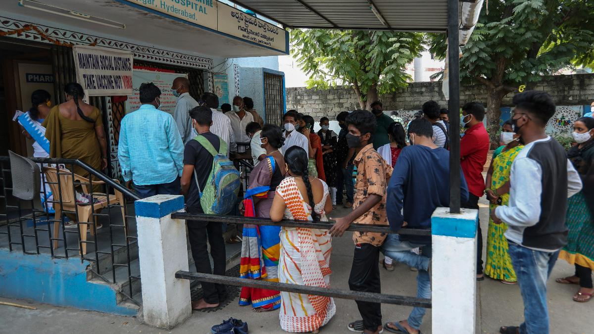 People standing in queue to get Covid-19 vaccine