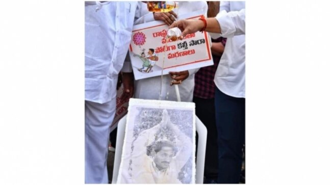 TDP leaders pour alcohol on Jagan Mohan Reddy's photo to protest liquor deaths