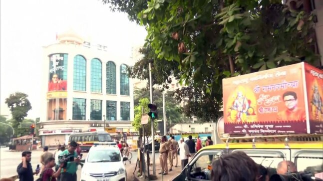 MNS workers play Hanuman Chalisa on loudspeaker outside Shiv Sena Bhawan in Mumbai, police detain leader