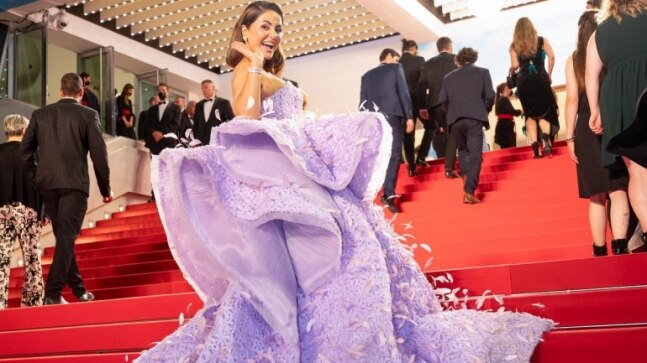 Hina Khan in a stellar feather gown reigns on Cannes red carpet like a queen. See pics