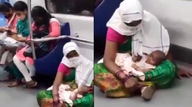 Woman with baby sits on the floor in metro while passengers occupy seats. Internet reacts - Vimarsana News