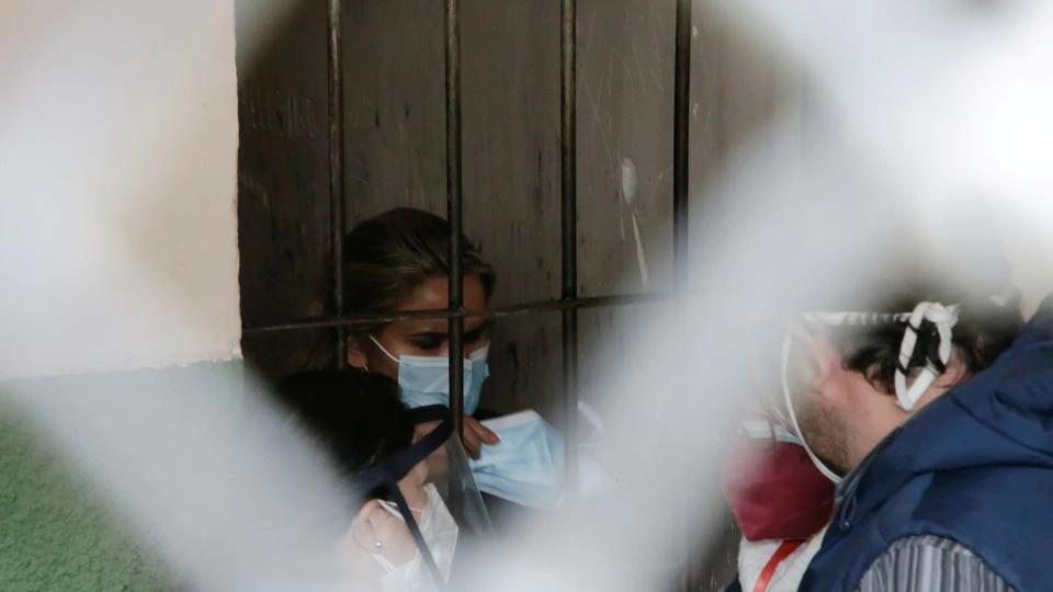 Bolivian court finds ex-president Anez guilty of coup Bolivia's former interim President Jeanine Anez holds a protective face mask as she is detained at a FELCC (Special Force to fight against Crime) prison in La Paz, Bolivia, March 13, 2021.