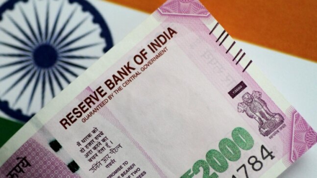 Rupee surges 13 paise against US dollar | Check latest value - Vimarsana News