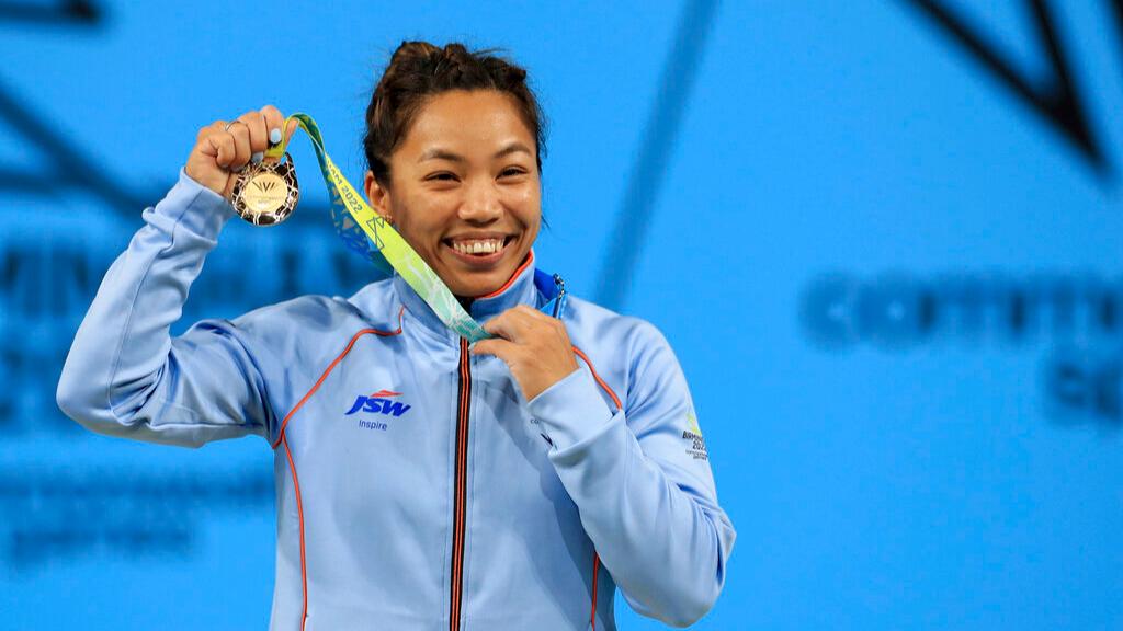 Mirabai Chanu poses with her Commonwealth gold medal